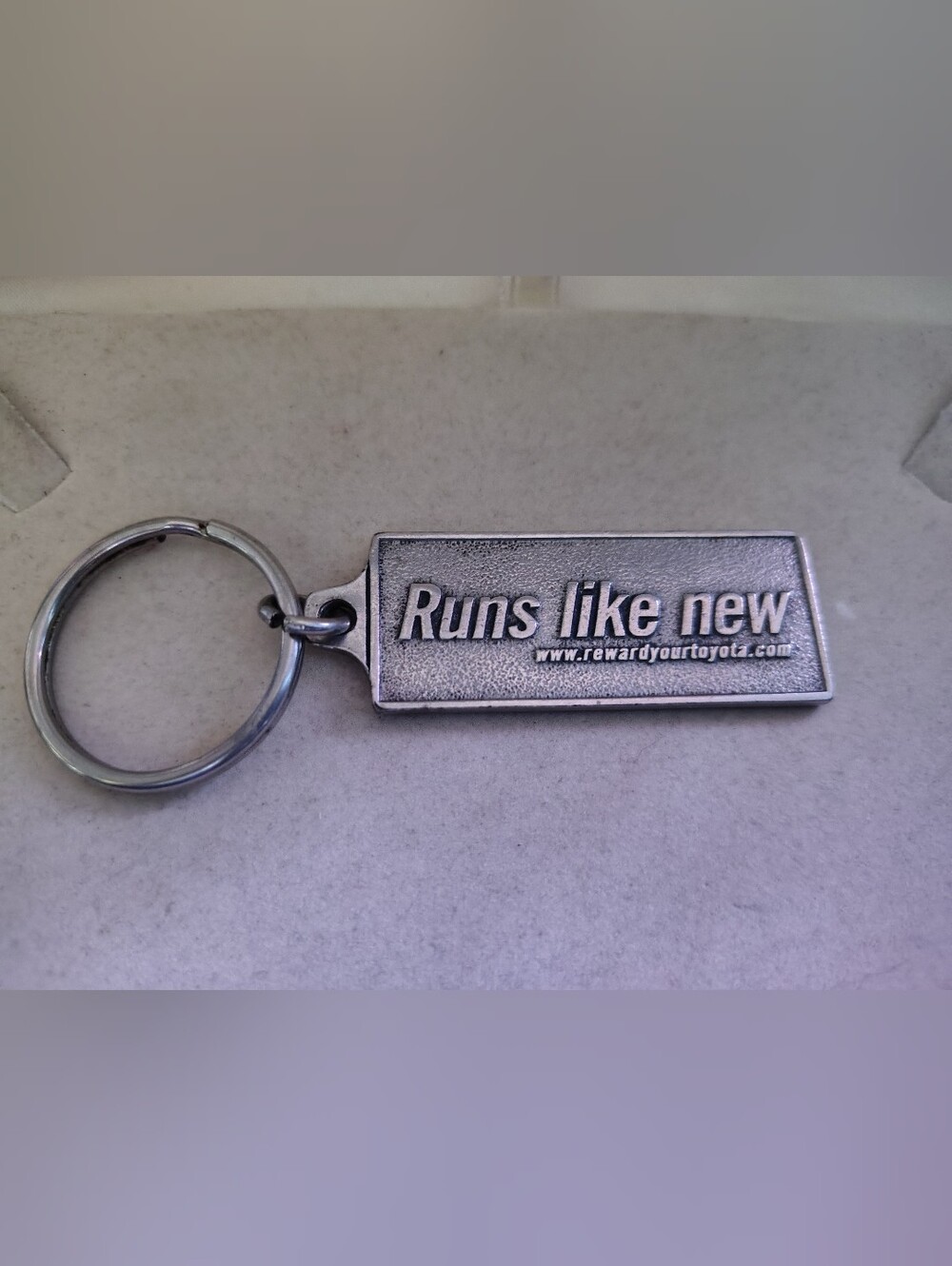Vintage Toyota Metal Keychain "The Feeling Never Ends" / "Runs Like New"